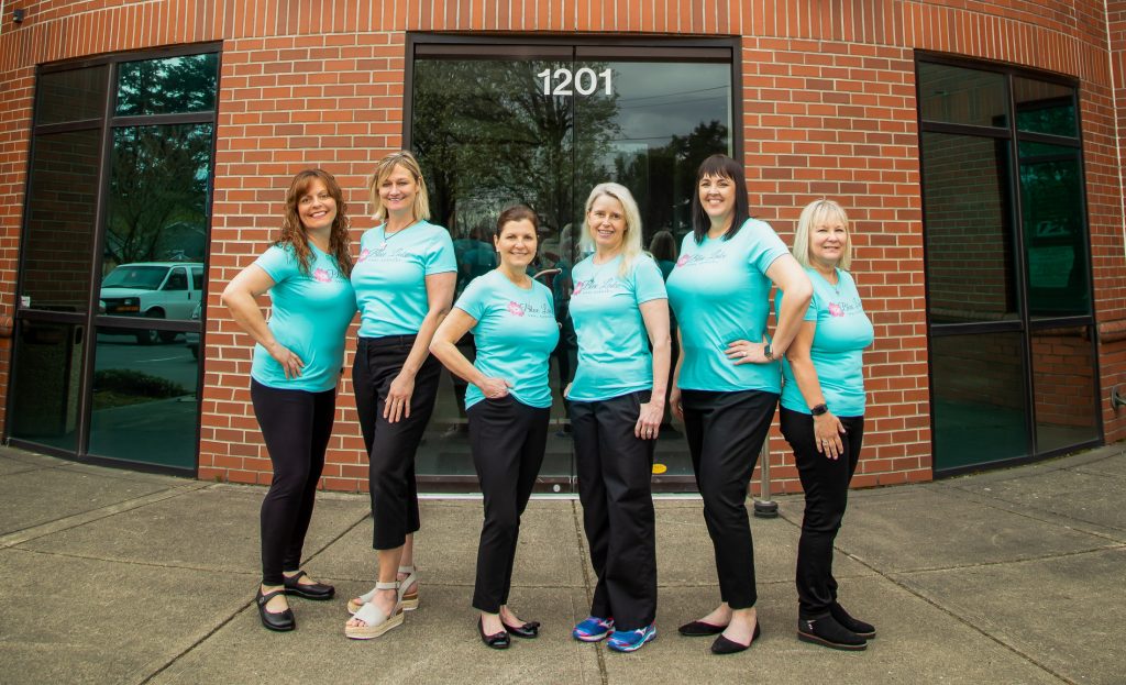 Staff in front of Blue Lake Oral Surgery office 